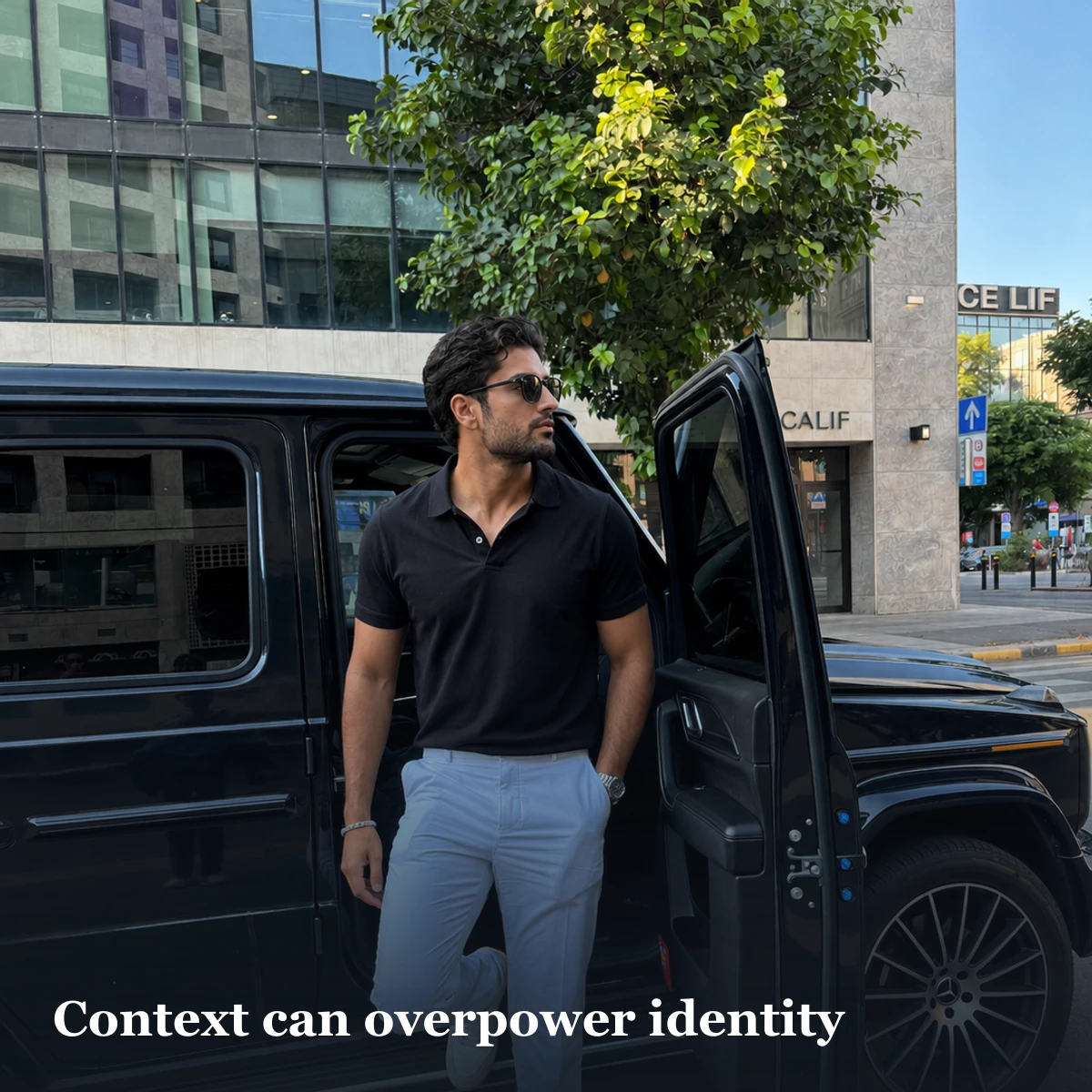 Portrait beside a vehicle illustrating how background context can compete with the person
