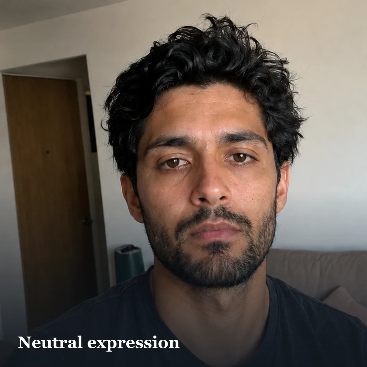 Neutral portrait illustrating one expression candidate for a men's dating profile