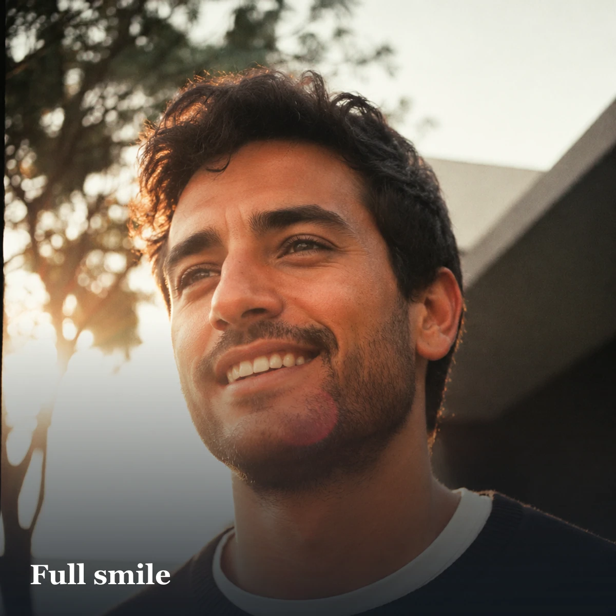 Outdoor portrait with a full smile illustrating a warm dating-profile expression