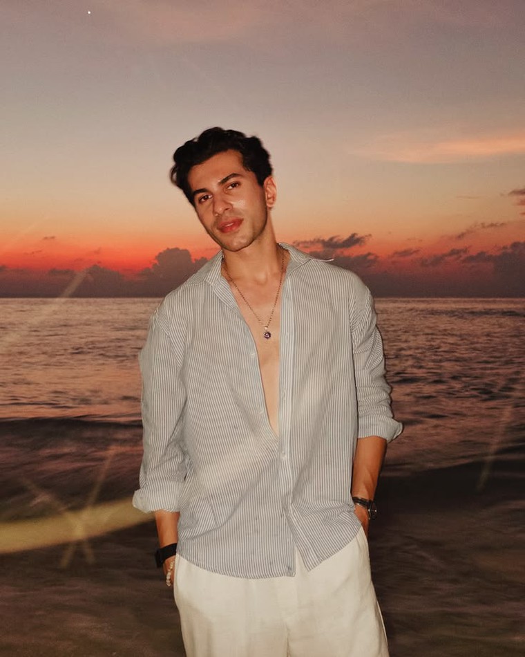 A beach setting illustrating natural context for casual clothing